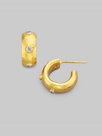 A sparkling constellation of delicate diamonds orbits around hoop earrings of hammered 24 kt. yellow gold. Diamonds, 0.24 tcw 24 kt. yellow gold Diameter, about ½ Post back Imported A sparkling constellation of delicate diamonds orbits around hoop earrings of hammered 24 kt. yellow gold. Diamonds, 0.24 tcw 24 kt. yellow gold Diameter, about ½ Post back Imported