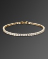 Sparkle never looked so sweet. CRISLU's head-turning tennis bracelet features a chic row of round-cut cubic zirconias (5-1/5 ct. t.w.) set in gold over sterling silver. Approximate length: 7 inches.