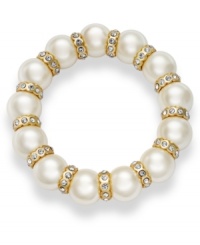 The classic appeal of pearls gets an elegant upgrade on this Charter Club bracelet. The acrylic pearls are paired with gold tone spacers embellished with glass accents. Stretches to fit wrist. Crafted in gold tone mixed metal. Approximate width: 2-3/4 inches. The classic appeal of pearls gets an elegant upgrade on this Charter Club bracelet. The acrylic pearls are paired with gold tone spacers embellished with glass accents. Stretches to fit wrist. Crafted in gold tone mixed metal. Approximate width: 2-3/4 inches.