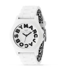 MARC BY MARC JACOBS goes graphic with his oversized rubber watch. Black signature logo on front and printed on interior of strap. Analog style, sweep second hand. MARC BY MARC JACOBS goes graphic with his oversized rubber watch. Black signature logo on front and printed on interior of strap. Analog style, sweep second hand.