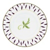 Frivole combines daring originality with soft feminity to create a sophisticated design for the table. Sprawling leaf-work designs add exuberant elegance to this whimsical pattern. Coordinating colors of amethyst and sage with gold trim allow versatility when entertaining formally or casually.