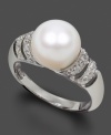 As radiant as she is. A solitary cultured freshwater pearl (9-10 mm) sets atop this sterling silver shimmering with diamond accents. Size 7.