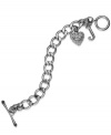 Stylishly romantic. Juicy Couture's lovely bracelet gets your heart racing with heart and J-shaped charms with glass stone accents. Complete with a toggle closure. Chain crafted in stainless steel. Approximate length: 8 inches. Approximate drop: 3/4 inch.