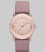 Smart and chic style with leather strap. Quartz movement Water resistant to 5 ATM Round ion-plated rose gold stainless steel case, 33mm (1.3) Rose gold mirror logo dial Second hand Metallic blush leather strap, 18mm wide (0.7) Imported 