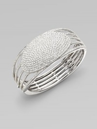 EXCLUSIVELY AT SAKS. Open strands of pavé crystal flow into a dazzling oval medallion of pure sparkle.Crystal Rhodium plated Diameter, about 2¼ Hinged with push-lock clasp Imported