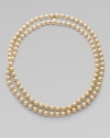 Endless pearl strand that is simply elegant. 10mm organic man-made pearls 48 long Imported