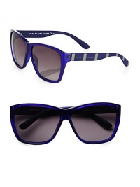 Classic, wayfarer-inspired design gets an update with striped logo temples. Available in blue with grey gradient lens.Logo temples100% UV protectionImported