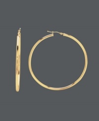 For a look of utter perfection -- try versatile hoops that go with any outfit. This large hoop design features a polished, 14k gold setting with a click backing. Approximate diameter: 2-1/4 inches. For a look of utter perfection -- try versatile hoops that go with any outfit. This large hoop design features a polished, 14k gold setting with a click backing. Approximate diameter: 2-1/4 inches.
