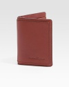 Bifold design crafted of rich Italian leather with topstitching and logo detail. Two card slots Two inside compartments ID window 3W X 4H Made in Italy 