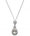 Add glamour to any look with Givenchy's stunning teardrop pendant. Crafted in silver tone mixed metal, round and pear-cut crystals create a shimmering effect. Approximate length: 16 inches + 2-inch extender. Approximate drop: 1-1/2 inches.