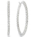Sparkle that shines from the inside out! These hoop earrings are decorated on both sides with round-cut diamonds (1 ct. t.w.) for ultimate shine. Set in 14k white gold. Approximate diameter: 31 mm.