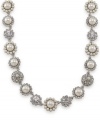 Get swept away by the old-fashioned romance of this Carolee collar necklace. Composed of alternating glass pearls and medallions set with crystal. Crafted in imitation rhodium-plated mixed metal. Approximate length: 16 inches + 2-inch extender.