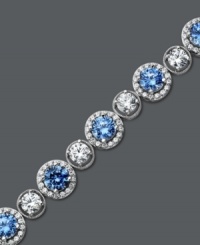 Perfect your party look with plenty of shine. Arabella's glamorous tennis bracelet combines round-cut blue and white Swarovski zirconias (22-9/10 ct. t.w.) for a look that's completely brilliant. Crafted in sterling silver. Approximate length: 7 inches. Perfect your party look with plenty of shine. Arabella's glamorous tennis bracelet combines round-cut blue and white Swarovski zirconias (22-9/10 ct. t.w.) for a look that's completely brilliant. Crafted in sterling silver. Approximate length: 7 inches.
