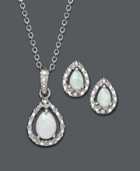 Splash yourself in iridescent shine. Victoria Townsend's shimmery jewelry set highlights pear-cut opals (5/8 ct. t.w.) and round-cut diamond accents. Crafted in sterling silver. Approximate length: 18 inches. Approximate pendant drop: 11/16 inch. Approximate earring drop: 5/16 inch. Splash yourself in iridescent shine. Victoria Townsend's shimmery jewelry set highlights pear-cut opals (5/8 ct. t.w.) and round-cut diamond accents. Crafted in sterling silver. Approximate length: 18 inches. Approximate pendant drop: 11/16 inch. Approximate earring drop: 5/16 inch.