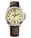 Keep it simple with this utilitarian watch by Tommy Hilfiger. Brown leather strap and round stainless steel case. Khaki-colored dial features brown numerals and military time, minute track, date window at six o'clock, luminous hands and iconic flag logo. Quartz movement. Water resistant to 30 meters. Ten-year limited warranty.
