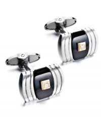 A little bit of everything. These sophisticated cuff links feature a rounded rectangular shape with a round-cut diamond center (1/2 ct. t.w.), onyx backdrop (10-3/4 ct. t.w.) and sterling silver setting with 14k gold accents. Approximate length: 3/4 inch. Approximate width: 7/16 inch. A little bit of everything. These sophisticated cuff links feature a rounded rectangular shape with a round-cut diamond center (1/2 ct. t.w.), onyx backdrop (10-3/4 ct. t.w.) and sterling silver setting with 14k gold accents. Approximate length: 3/4 inch. Approximate width: 7/16 inch.
