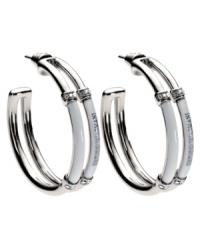 Rev up your look. This Emporio Armani hoop earrings feature logo-embossed white enamel and crystal accents in stainless steel. Approximate diameter: 1 inch. Rev up your look. This Emporio Armani hoop earrings feature logo-embossed white enamel and crystal accents in stainless steel. Approximate diameter: 1 inch.