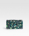 Raso stone-covered satin in a box design.Magnetic snap flap closureOne inside open pocketSatin lining7¼W X 3½H X 2DMade in Italy