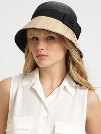 A vintage-inspired design with a modern, wood accented brim and sweet grosgrain bow. CelluloseWood trimBrim, about 3Clean with damp clothMade in Italy A vintage-inspired design with a modern, wood accented brim and sweet grosgrain bow. CelluloseWood trimBrim, about 3Clean with damp clothMade in Italy
