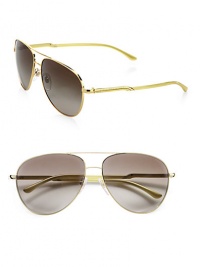 Following the brand's green initiatives, this sustainable design that is a part of the Gold Project created for the 2012 Olympic Games uses raw materials that stem from natural origins, yet retains its chic style with a lightweight metal frame and plastic temples. Available in gold with brown gradient lens. Metal logo temples100% UV protectionImported Following the brand's green initiatives, this sustainable design that is a part of the Gold Project created for the 2012 Olympic Games uses raw materials that stem from natural origins, yet retains its chic style with a lightweight metal frame and plastic temples. Available in gold with brown gradient lens. Metal logo temples100% UV protectionImported