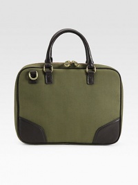 This compact laptop tote is ideal for travel and everyday use.Zip closureTop handlesAdjustable cross body strapInterior side pocketNylon with leather trimCotton lining13W x 10½H x 2DImported This compact laptop tote is ideal for travel and everyday use.Zip closureTop handlesAdjustable cross body strapInterior side pocketNylon with leather trimCotton lining13W x 10½H x 2DImported