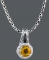 A sunshine-inspired drop elevates any look. Balissima by Effy Collection's stunning pendant necklace features a round-cut citrine (1-5/8 ct. t.w.) surrounded by sparkling, round-cut diamonds (1/8 ct. t.w.). Set in sterling silver with 18k gold accents. Approximate length: 18 inches. Approximate pendant drop: 9/10 inch. Approximate pendant width: 1/2 inch.