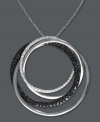 Sublime circles. Caviar by Effy Collection's intricate pendant combines overlapping circles in round-cut white diamonds (1/5 ct. t.w.) and black diamonds (7/8 ct. t.w.). Set in 14k white gold. Approximate length: 18 inches. Approximate drop: 1-5/16 inches.