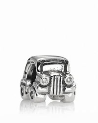 A whimsical vintage-style car charm with sparking head and tail lights in white and red cubic zirconia. From PANDORA. A whimsical vintage-style car charm with sparking head and tail lights in white and red cubic zirconia. From PANDORA.