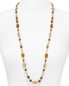 Lauren by Ralph Lauren channels exotic glamor with this beaded necklace. Crafted of 14 karat gold, its antique gold bead work and gorgeous marble-like stations have a far away feel.