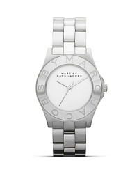 Perfect playful accessorizing with this watch from MARC BY MARC JACOBS. Crafted from stainless steel with a logo-engraved bezel, this piece has style-setter written all over it. Perfect playful accessorizing with this watch from MARC BY MARC JACOBS. Crafted from stainless steel with a logo-engraved bezel, this piece has style-setter written all over it.