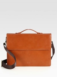 A streamlined yet structured take on the classic briefcase, constructed in smooth, refined leather with a top handle and an adjustable and removable shoulder strap for added comfort and convenience.Magnetic flap closureTop handleAdjustable shoulder strapInterior zip pocketFully lined Leather15W x 11H x 3DImported A streamlined yet structured take on the classic briefcase, constructed in smooth, refined leather with a top handle and an adjustable and removable shoulder strap for added comfort and convenience.Magnetic flap closureTop handleAdjustable shoulder strapInterior zip pocketFully lined Leather15W x 11H x 3DImported