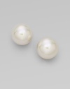 Classic white pearl studs are eternally chic. 14mm organic man-made pearls 18k goldplated sterling silver Post back Made in Spain