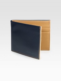 Handsomely crafted calfskin leather features a retro-inspired, two-tone detail with constrast stitching.Six card slots4W x 3¼HMade in Italy Handsomely crafted calfskin leather features a retro-inspired, two-tone detail with constrast stitching.Six card slots4W x 3¼HMade in Italy
