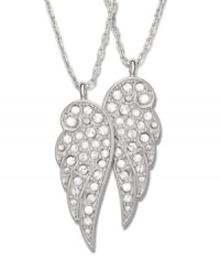 The perfect gift to show your best friend how much they mean to you! With this set of two classic pendants, you can keep one for yourself and give the other to your friend. Each one features a delicate wing in clear crystal pavé hanging on a silver tone mixed metal chain. Approximate length: 17-1/2 inches. Approximate drop: 1-1/8 inches. The perfect gift to show your best friend how much they mean to you! With this set of two classic pendants, you can keep one for yourself and give the other to your friend. Each one features a delicate wing in clear crystal pavé hanging on a silver tone mixed metal chain. Approximate length: 17-1/2 inches. Approximate drop: 1-1/8 inches.