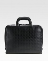 Single gusset briefcase crafted from gancini stamped calfskin leather featuring a removable, inside computer pocket to secure your investment in style.Zip closureDouble top handlesInterior pocketsLeather15W x 11H x 2DMade in Italy