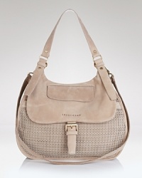 The slouchy shape of Longchamp's suede hobo makes it easy to wear on the arm while the perforated leather lends cool. Carry this accessory for round-the-clock chic. The slouchy shape of Longchamp's suede hobo makes it easy to wear on the arm while the perforated leather lends cool. Carry this accessory for round-the-clock chic.