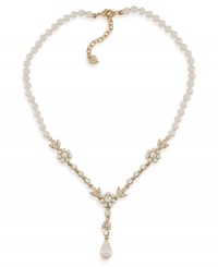 Stop and smell the flowers with this floral-designed necklace by Carolee. Glass and plastic pearls make a stunning statement with a plunging Y-shaped pendant embellished with glass stone accents. Crafted in gold tone mixed metal. Approximate length: 16 inches + 2-inch extender. Stop and smell the flowers with this floral-designed necklace by Carolee. Glass and plastic pearls make a stunning statement with a plunging Y-shaped pendant embellished with glass stone accents. Crafted in gold tone mixed metal. Approximate length: 16 inches + 2-inch extender.