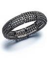 Get ready for an evening of glamour. Slip this Alfani bracelet over your wrist for head-turning shine. Crafted in hematite tone mixed metal. Bracelet stretches to fit wrist. Approximate length: 7-1/2 inches. Approximate diameter: 2 inches.