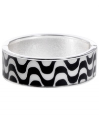 Channel the exoticism and energy of Brasil in Haskell's inspired skinny bangle. The Streets bangle features a black and white wavy print design, set in silver tone mixed metal with a hinge clasp. Approximate diameter: 2-1/2 inches. Approximate length: 8 inches. Item comes packaged in a turquoise gift box. Channel the exoticism and energy of Brasil in Haskell's inspired skinny bangle. The Streets bangle features a black and white wavy print design, set in silver tone mixed metal with a hinge clasp. Approximate diameter: 2-1/2 inches. Approximate length: 8 inches. Item comes packaged in a turquoise gift box.