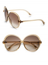 THE LOOKOversized round style Translucent gradient framesLogo accented end-pieces Signature case includedTHE COLORChampagne with brown gradient lensORIGINMade in Italy THE LOOKOversized round style Translucent gradient framesLogo accented end-pieces Signature case includedTHE COLORChampagne with brown gradient lensORIGINMade in Italy