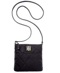 Preppy with an easygoing attitude, this quilted crossbody from Tommy Hilfiger is the ultimate on-the-go design. Crafted from durable nylon with custom hardware, it's ideal for work or weekends. Preppy with an easygoing attitude, this quilted crossbody from Tommy Hilfiger is the ultimate on-the-go design. Crafted from durable nylon with custom hardware, it's ideal for work or weekends.