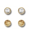 Unique and effortless. Swarovski's Harley Golden Shadow Pierced Earrings Set highlights bezel-set crystals in clear and gold. Crafted in gold and silver tone mixed metal. Approximate diameter: 1/8 inch.