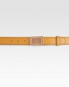 Italian leather belt joined together with an enamel plaque logo buckle.Leather1.2 wideMade in Italy