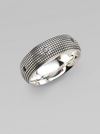 Handsomely sculpted band of sterling silver is embellished with a simple row of diamonds.Sterling silverDiamondAbout 1 diamImported Handsomely sculpted band of sterling silver is embellished with a simple row of diamonds.Sterling silverDiamondAbout 1 diamImported
