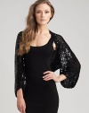 Sequin crochet in an easy-fitting tube shape fits over the shoulders for a glamorous evening look. Rayon; dry clean One size fits most Imported