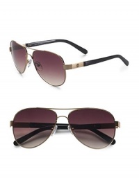 Classic aviator style gets a chic update in goldtone metal with signature Tory logo at temple. Available in gold with smoke gradient lens. UV 400 lens 100% UV protection Imported Classic aviator style gets a chic update in goldtone metal with signature Tory logo at temple. Available in gold with smoke gradient lens. UV 400 lens 100% UV protection Imported