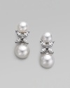 A radiant pairing of organic white pearls with sparkling cubic zirconia X-shaped accents. 12mm man-made pearls Cubic zirconia Rhodium-plated sterling silver Drop, about 1 Post-and-hinge back Imported