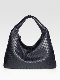 Utter simplicity in buttery woven leather in a classic hobo shape. Single shoulder strap, 5 drop Braid trim Top zip closure Inside zip pocket Suede lining 22W X 15H X 2½D Made in Italy Utter simplicity in buttery woven leather in a classic hobo shape. Single shoulder strap, 5 drop Braid trim Top zip closure Inside zip pocket Suede lining 22W X 15H X 2½D Made in Italy