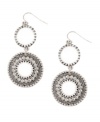 Take hippie-chic to a whole new level. These bohemian-style earrings by Jessica Simpson feature artfully-crafted double disc drops in worn silver tone mixed metal. Approximate drop: 3 inches.