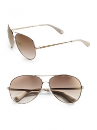 Stylish metal aviators with engraved logo temple detail. Available in gold with brown/gold flash mirror lens.100% UV protection Imported Stylish metal aviators with engraved logo temple detail. Available in gold with brown/gold flash mirror lens.100% UV protection Imported